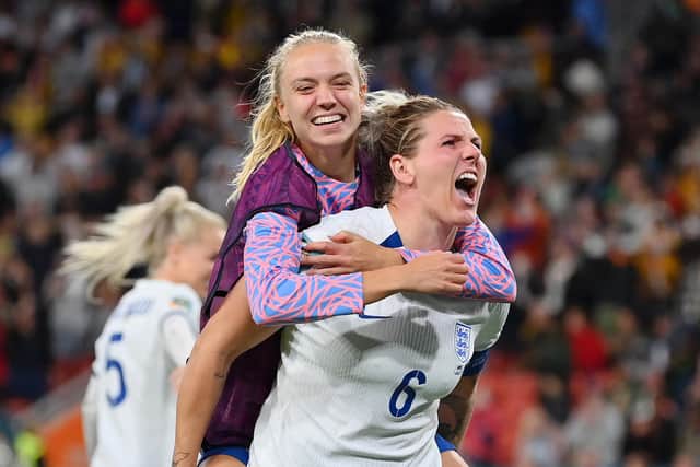 Climb on: Sheffield stars Millie Bright and Esme Morgan celebrate England's victory over Nigeria on penalties en route to the final (Picture: Justin Setterfield/Getty Images)