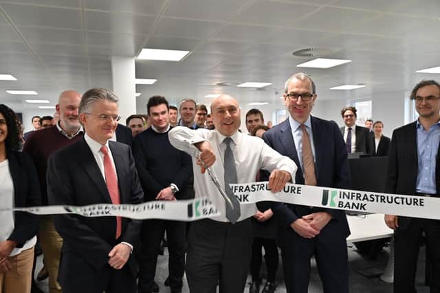 Economic secretary to the treasury Andrew Griffith (middle) opens the UK Infrastructure Bank's new office space with CEO John Flint (left) and chair Chris Grigg (right).
