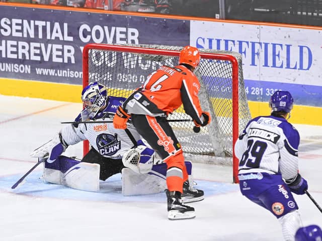 EARLY START: Patrick Watling (#14) tips in from Josh Nicholls to make it 1-0 to Sheffield Steelers against Glasgow Clan on Saturday night. Picture: Dean Woolley/Steelers Media