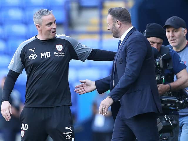 Bolton Wanderers' manager Ian Evatt (right) and Barnsley manager Michael Duff (left) shake hands at the end of the game of the Sky Bet League One play-off semi-final first leg match at the University of Bolton Stadium, Bolton. Picture date: Saturday May 13, 2023. PA Photo. See PA story SOCCER Bolton. Photo credit should read: Barrington Coombs/PA Wire.

RESTRICTIONS: EDITORIAL USE ONLY No use with unauthorised audio, video, data, fixture lists, club/league logos or "live" services. Online in-match use limited to 120 images, no video emulation. No use in betting, games or single club/league/player publications.