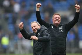 Huddersfield Town boss Neil Warnock and assistant Ronnie Jepson, who will be leaving the club after Wednesday's home game with Stoke City. Picture: PA.