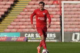 Barnsley's Josh Earl, pictured in action last season. Picture: Jonathan Gawthorpe