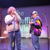 Ed Sheeran performs ‘Shape of You’ with music student Lol Bailey, 19, during a visit to The Sheffield College.