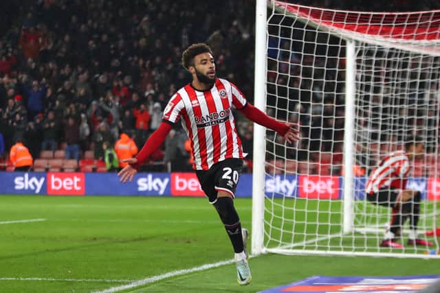 SHEFFIELD, ENGLAND - JANUARY 14: Jayden Bogle of Sheffield United celebrates scoring his team's third goal during the Sky Bet Championship between Sheffield United and Stoke City at Bramall Lane on January 14, 2023 in Sheffield, England. (Photo by Ashley Allen/Getty Images)