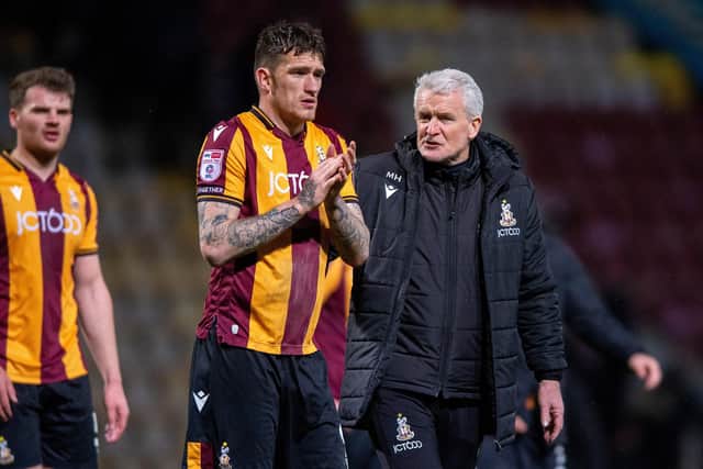 Mark Hughes and Andy Cook at full time.
Bradford City v Carlisle United.  SkyBet League 2.  University of Bradford Stadium.
Picture by Yorkshire Post Photographer Bruce Rollinson.
21 March 2023.  Picture Bruce Rollinson