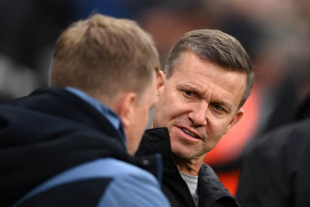 NEWCASTLE UPON TYNE, ENGLAND - DECEMBER 31: Jesse Marsch, Manager of Leeds United, speaks with Eddie Howe, Manager of Newcastle United, prior to the Premier League match between Newcastle United and Leeds United at St. James Park on December 31, 2022 in Newcastle upon Tyne, England. (Photo by Stu Forster/Getty Images)