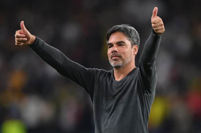 BERN, SWITZERLAND - SEPTEMBER 14: David Wagner, Head Coach of Young Boys gives a thumbs up to the fans following their side's victory in the UEFA Champions League group F match between BSC Young Boys and Manchester United at Stadion Wankdorf on September 14, 2021 in Bern, Switzerland. (Photo by Matthias Hangst/Getty Images)