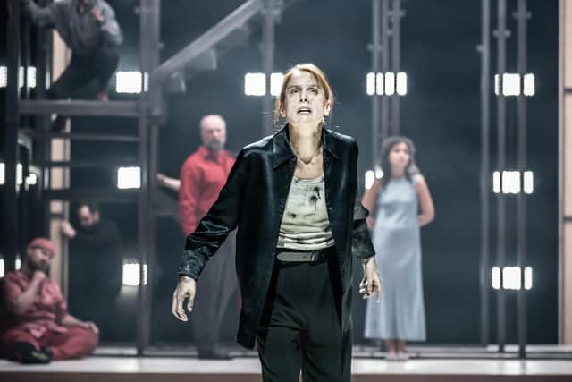 Kelly Gough as Cassius and the company of the RSC's production of Julius Caesar. Picture: Marc Brenner
