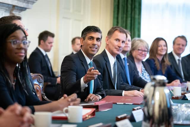 Rishi Sunak, alongside the Chancellor of the Exchequer, Jeremy Hunt, holds his first Cabinet meeting