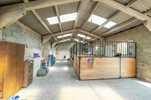 This modern agricultural building houses four stables