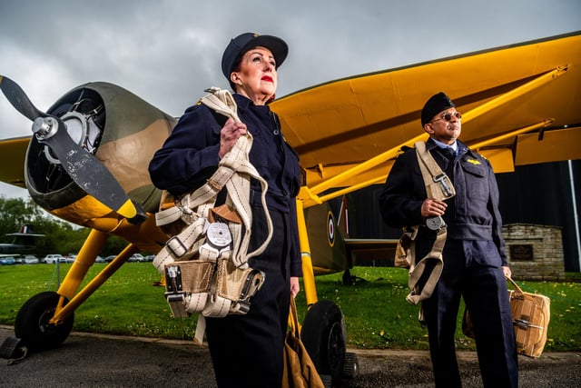 Pictured Yvonne Somrani, and Richi Redtial both dressed as ATA Officers infront of the Fairchild Argus aircraft.
Picture By Yorkshire Post Photographer,  James Hardisty
