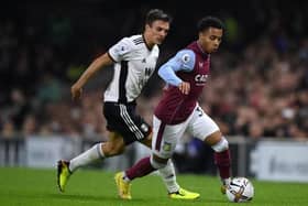 LONDON, ENGLAND - OCTOBER 20: Cameron Archer of Aston Villa runs ahead of Joao Palhinha of Fulham during the Premier League match between Fulham FC and Aston Villa at Craven Cottage on October 20, 2022 in London, England. (Photo by Justin Setterfield/Getty Images)