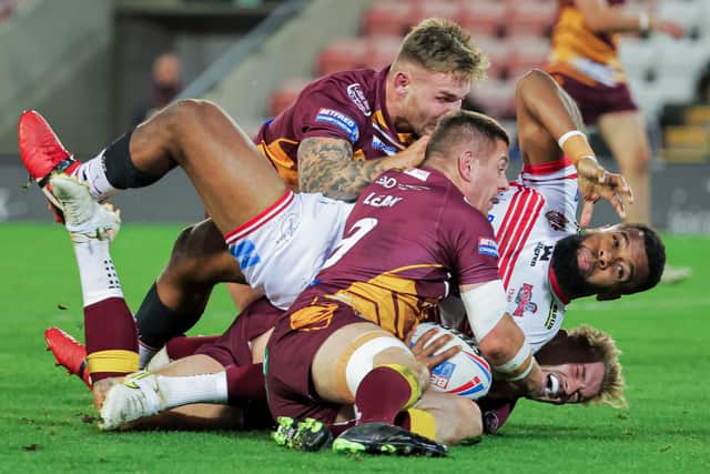 Picture by Alex Whitehead/SWpix.com - 02/10/2022 - Rugby League - Betfred Championship Grand Final - Leigh Centurions vs Batley Bulldogs - Leigh Sports Village, Leigh, England - Leigh’s Ben Nakubuwai is tackled by Batley’s Alistar Leak, Ben White and Luke Hooley.