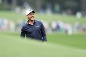 All smiles again: Danny Willett of England laughs on the eighth hole (Picture: Warren Little/Getty Images)