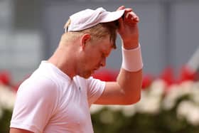 DOWN AND OUT: Kyle Edmund shows his dejection after his straight sets defeat against Dominic Thiem during their first round match at the Mutua Madrid Open Picture: Clive Brunskill/Getty Images.