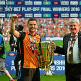 Former Hull City defender Alex Bruce has taken on a new role. Image: LYN KIRK/AFP via Getty Images