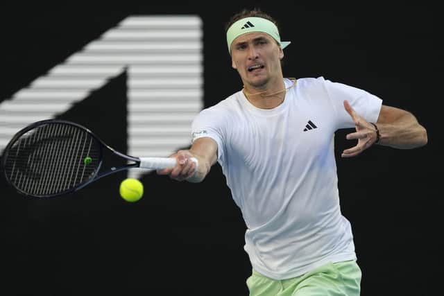 Alexander Zverev of Germany plays a forehand return to Cameron Norrie of Britain during their fourth round match at the Australian Open. (AP Photo/Alessandra Tarantino)