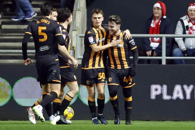 OPENING SALVO: Hull City's Aaron Connolly (right) celebrates scoring his side's first goal of the game at Ashton Gate, Bristol. Picture: Nigel French/PA