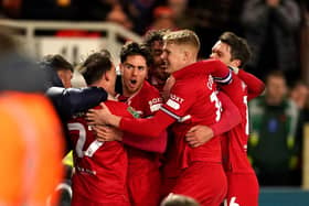 HALFWAY THERE: Middlesbrough's Hayden Hackney (centre) celebrates scoring against Chelsea in the Carabao Cup semi final first leg match at the Riverside Stadium on Tuesday night. Picture: Martin Rickett/PA