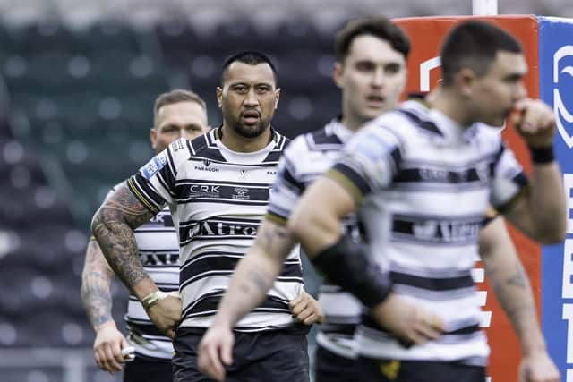 Ligi Sao and team-mates appear dejected during the game against Salford Red Devils. (Photo: Allan McKenzie/SWpix.com)