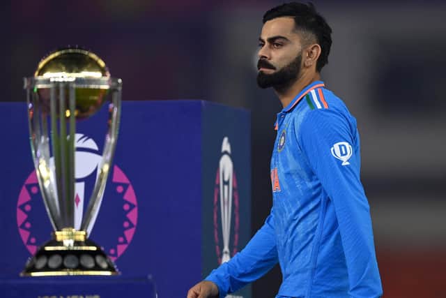 One that got away: Virat Kohli of India walks past the ICC Men's Cricket World Cup trophy after his unbeaten side and the hosts lost the final to Australia on Sunday. (Picture: Gareth Copley/Getty Images)
