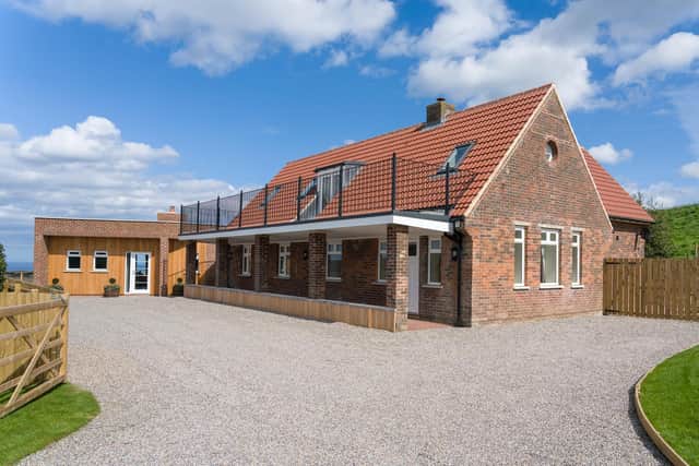 The property boasts five bedrooms and four bathrooms as well as a modern extension