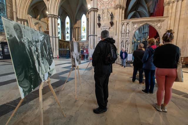 People queue past pictures to sign the book of Condolence at York Minster where people queued to sign following the death of HRH Queen Elizabeth on thursday.
9 September 2022. Picture Bruce Rollinson