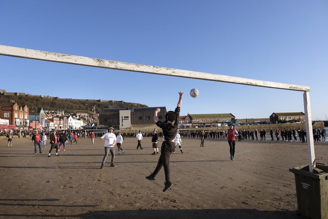 The big Boxing Day football match between the Fishermen and the Firemen in Scarborough.