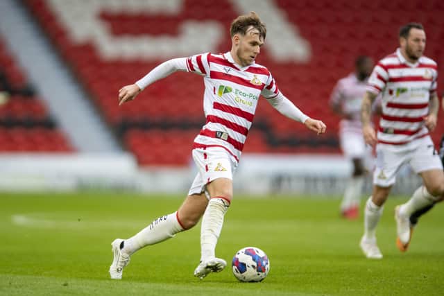 CLOSE CALL: Doncaster Rovers midfielder Kyle Hurst came closest to scoring for his team in a miserable night at Stevenage Picture Tony Johnson