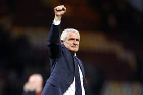 Bradford City manager Mark Hughes salutes the Valley Parade faithful during the home leg with Carlisle (Picture: PA)