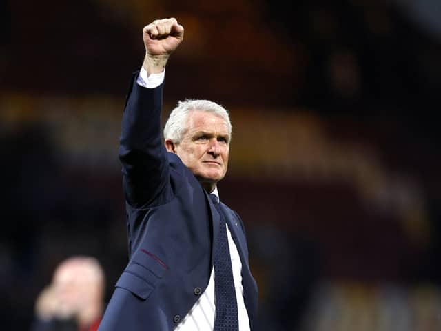 Bradford City manager Mark Hughes salutes the Valley Parade faithful during the home leg with Carlisle (Picture: PA)