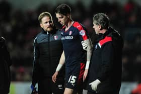 BRISTOL, UNITED KINGDOM - APRIL 05: Greg Halford of Rotherham United(C) is helped from the pitch during the Sky Bet Championship match between Bristol City and Rotherham United at Ashton Gate on April 5, 2016 in Bristol, United Kingdom. (Photo by Harry Trump/Getty Images)