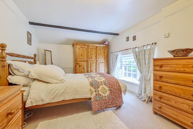 One of the three bedrooms with the bed positioned so you can wake up to rural views