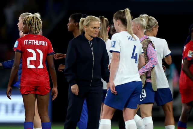 CONFIDENT: England head coach Sarina Wiegman (centre left) congratulates the players on the pitch after their Group D victory over Haiti at Brisbane's Lang Park. Picture: Isabel Infantes/PA