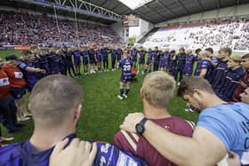 Hull KR huddle after their loss to Wigan. (Photo: Allan McKenzie/SWpix.com)