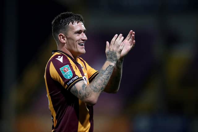 BRADFORD, ENGLAND - AUGUST 09: Andy Cook of Bradford City applauds the fans following victory in the Carabao Cup First Round match between Bradford City and Hull City at University of Bradford Stadium on August 09, 2022 in Bradford, England. (Photo by George Wood/Getty Images)
