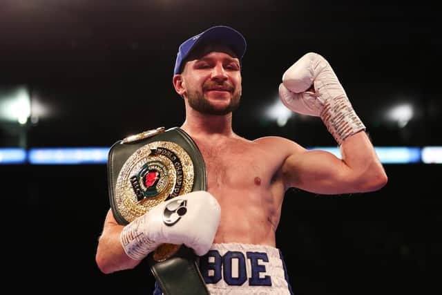 Maxi Hughes celebrates with the IBO World Lightweight belt after defeating Kid Galahad in the IBO World Lightweight title fight at Motorpoint Arena Nottingham on September 24, 2022 in Nottingham, England. (Photo by Nathan Stirk/Getty Images)