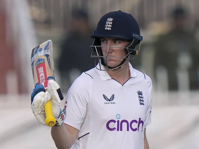 TOP MARKS: Yorkshire's Harry Brook celebrates his half century in the first Test match between Pakistan and England in Rawalpindi Picture: AP Photo/Anjum Naveed