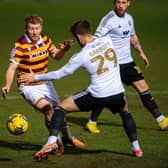 ON TARGET: Brad Halliday - pictured battling with Salford City's Luke Garbutt - scored the Bantams equaliser on Tuesday night. Picture: Bruce Rollinson