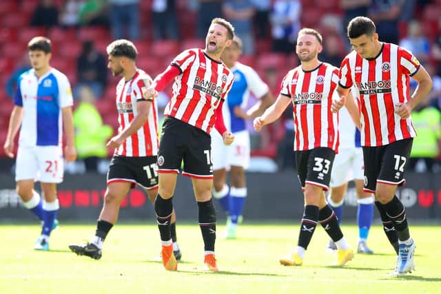 SHEFFIELD, ENGLAND - AUGUST 20: Oliver Norwood of Sheffield United celebrates after scoring their side's first goal during the Sky Bet Championship between Sheffield United and Blackburn Rovers at Bramall Lane on August 20, 2022 in Sheffield, England. (Photo by George Wood/Getty Images)
