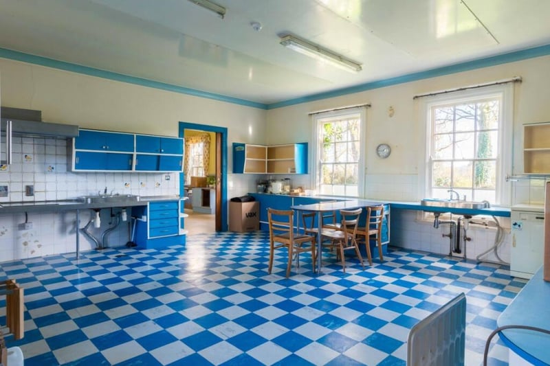 The large kitchen is in need of updating but offers scope for a fabulous family kitchen-dining room