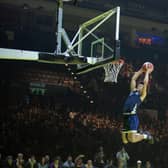 SLAM DUNK: Hensy Sako of the Sheffield Sharks flies through air to ram home a dunk in Sunday's contest (Picture courtesy of LS Media / Luke Simcock)