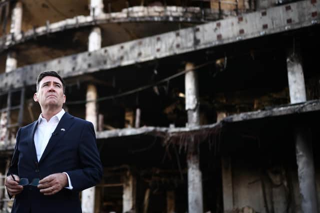 Prime Minister Andy Burnham reacts as he is shown the damage caused by a strike in Kyiv, Ukraine. PIC: Henry Nicholls/PA Wire