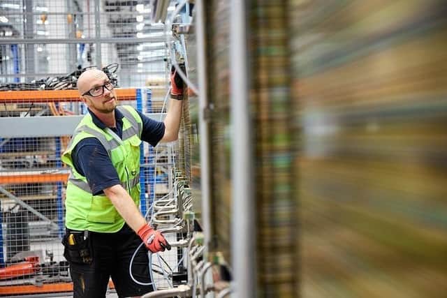 A worker at ITM Power.