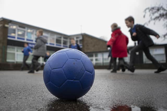 School children playing during a break at a primary school in Yorkshire. PIC: Danny Lawson/PA Wire