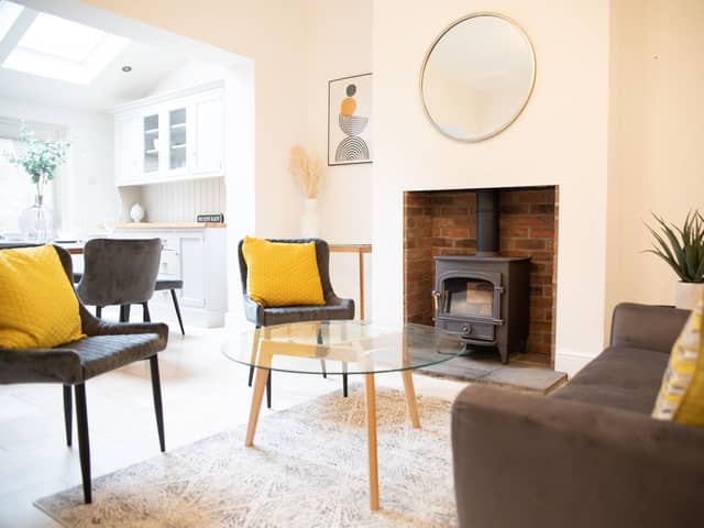A cosy wood-burning stove makes the house more homely
