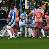 Huddersfield Town's Michal Helik puts the hosts in front on derby day against Leeds United. Picture: Jonathan Gawthorpe.