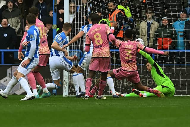 Huddersfield Town's Michal Helik puts the hosts in front on derby day against Leeds United. Picture: Jonathan Gawthorpe.