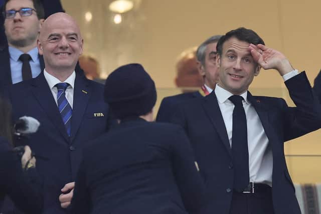 FIFA President Gianni Infantino and France's President Emmanuel Macron attend the Qatar 2022 World Cup semi-final football match between France and Morocco at the Al-Bayt Stadium in Al Khor (Picture: KARIM JAAFAR/AFP via Getty Images)