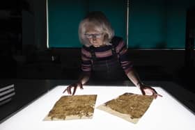 Shirley Jones Head of Conservation looks at pages from the Whitby Abbey Coucher Book dated 1470.